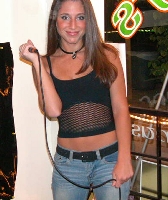 Take My Breath Away.        That's not the song she was singing,  It's just what she does.