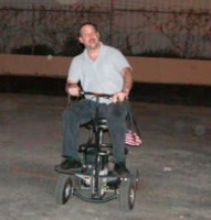Frank E racing moterized bar stools in frenchie's parking lot