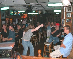 The Boston's crowd likes to dance while people sing.